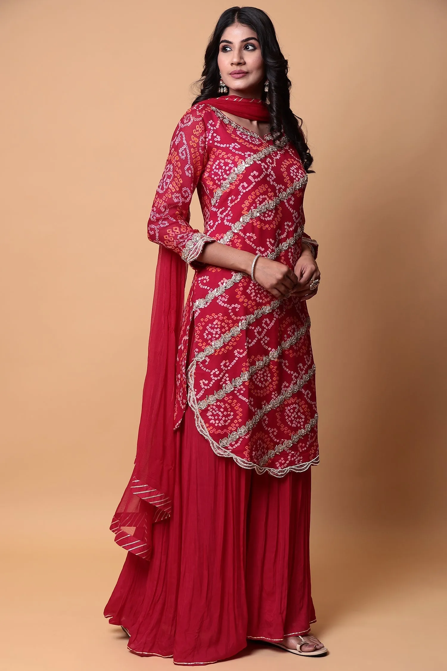 Bandhej Georgette Sharara Suit with Gota Patti work.