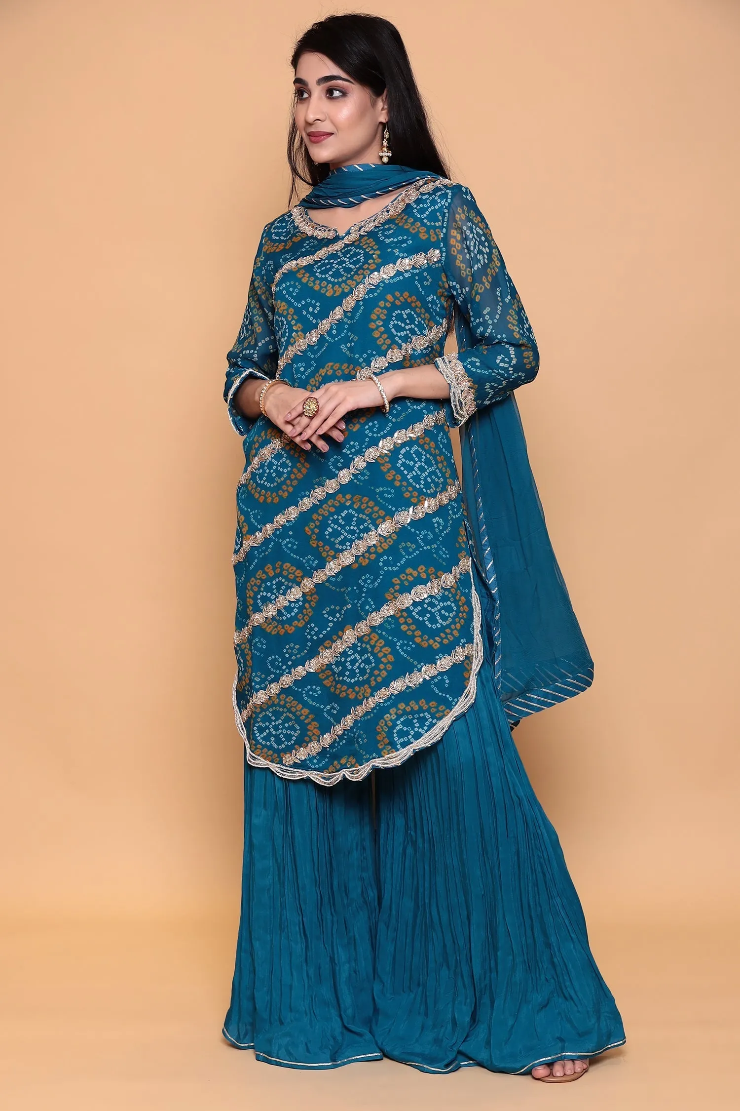 Bandhej Georgette Sharara Suit with Gota Patti work.