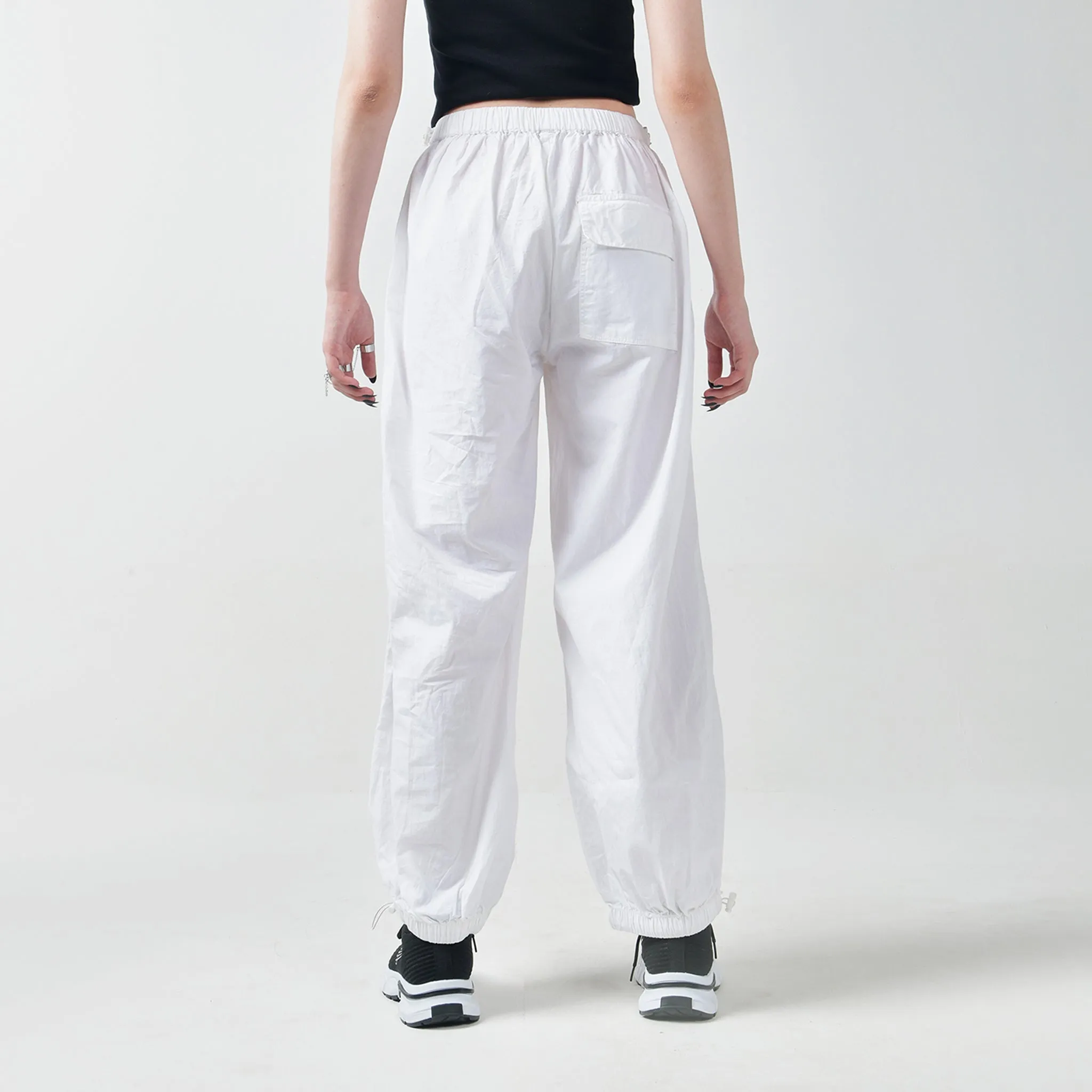 Black Ruffle Top & White Parachute Pants