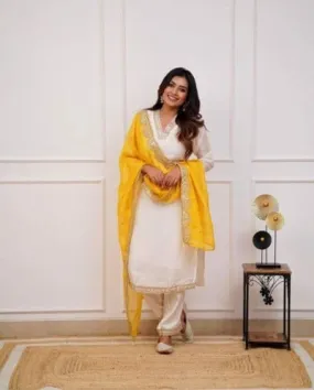 Ivory Heavy Muslin Silk Salwar Suit With Yellow Chiffon Dupatta