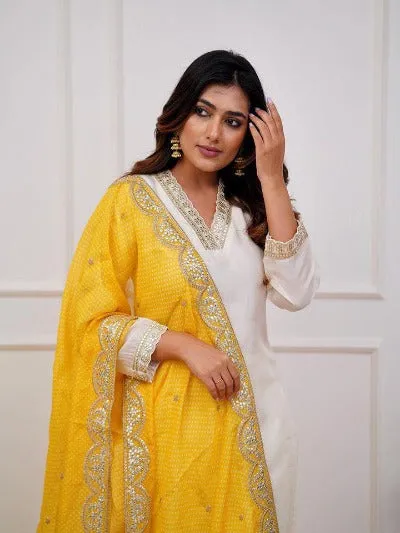 Ivory Heavy Muslin Silk Salwar Suit With Yellow Chiffon Dupatta