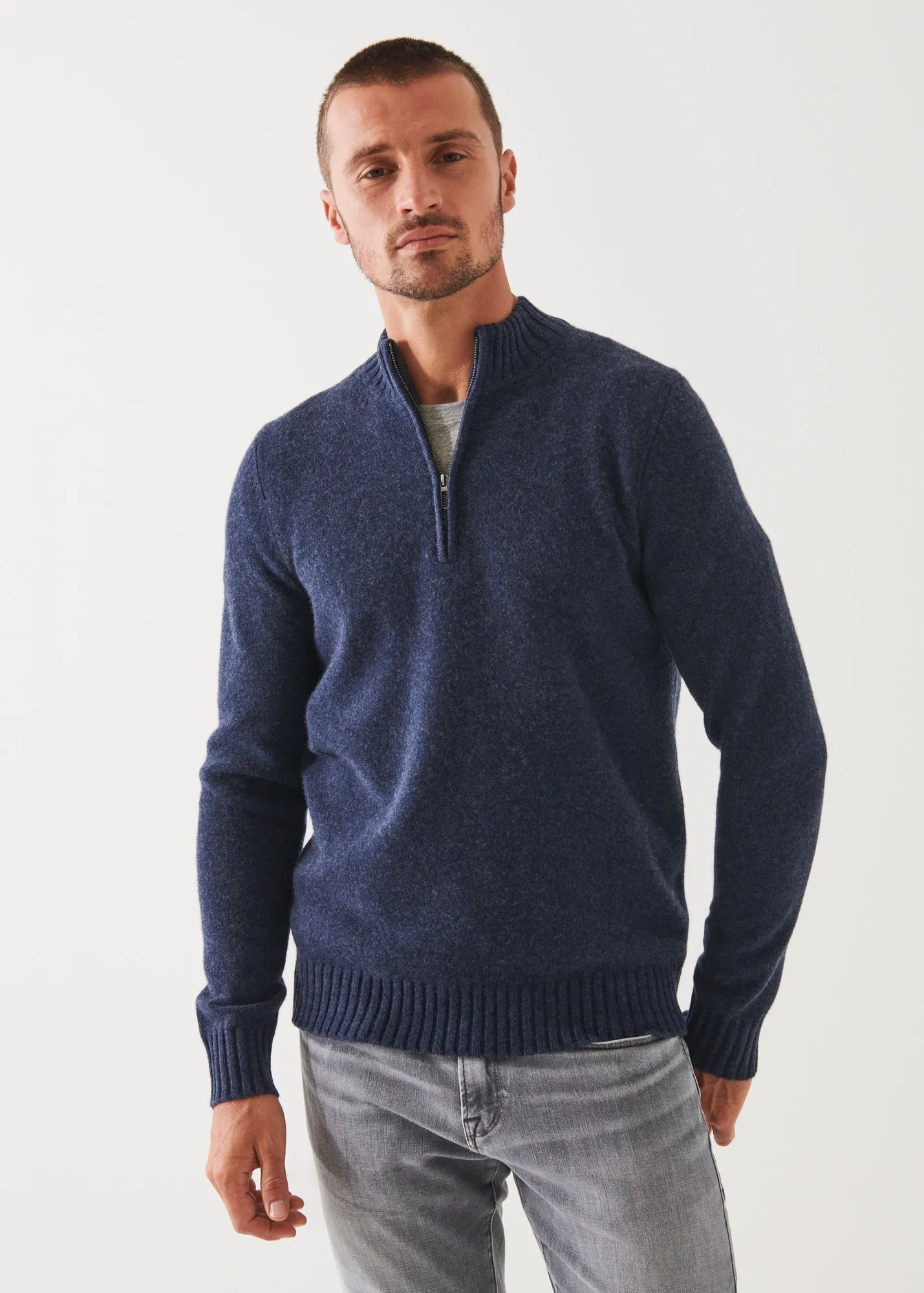 MERINO QUARTER ZIP SWEATER