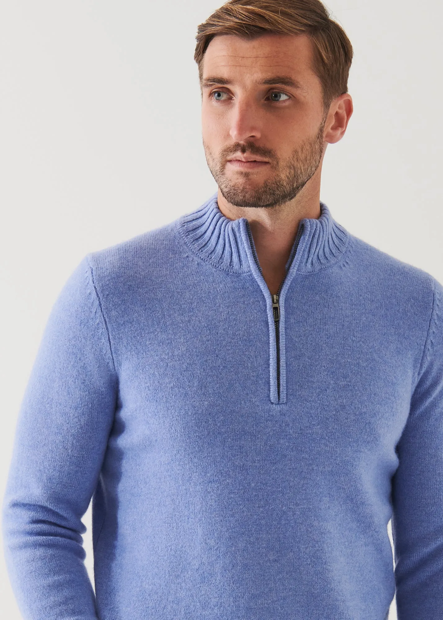 MERINO QUARTER ZIP SWEATER