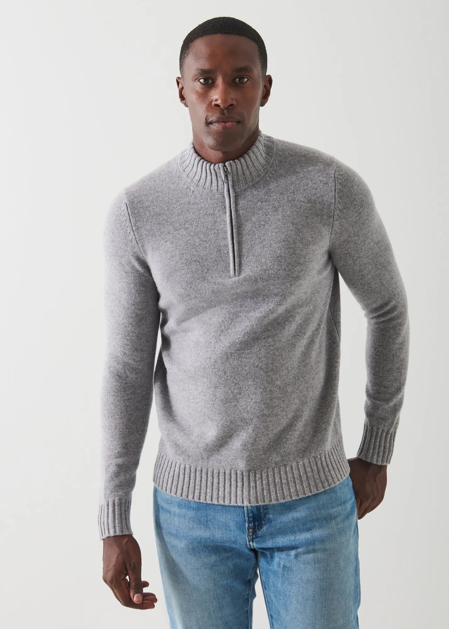 MERINO QUARTER ZIP SWEATER